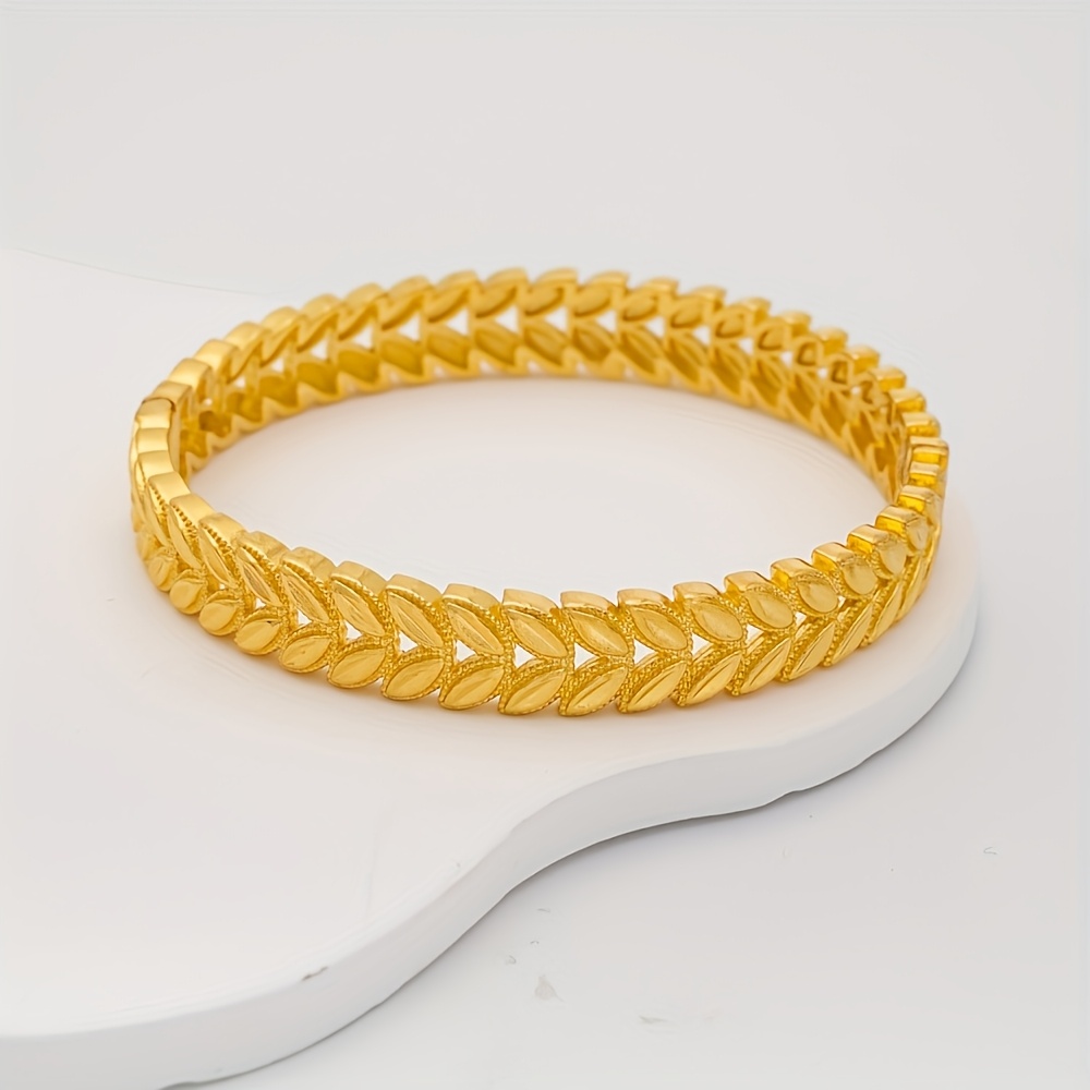 Adjustable Cuff Bracelet with Intricate Leaf Pattern